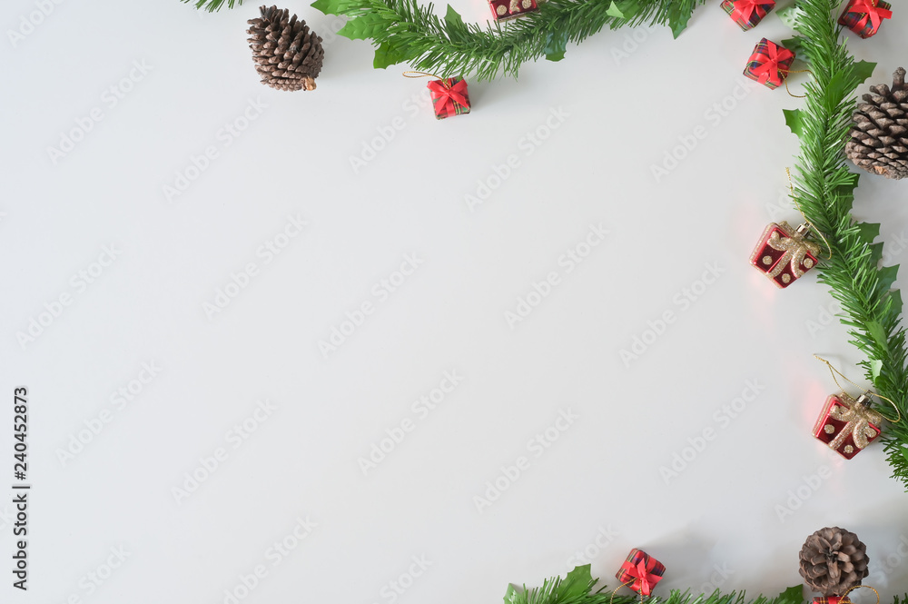 Fototapeta premium Xmas Copy space, Christmas composition decorations on white background Flat lay, top view.
