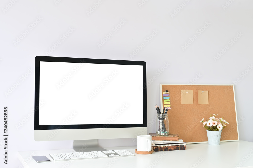 Workspace with Mockup laptop computer on office table and office supplies. Workspace with Mockup laptop computer on office table and office supplies.