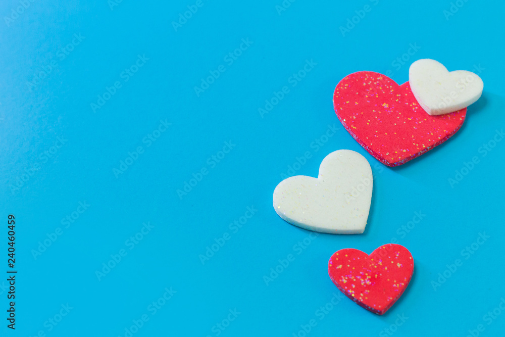 heart on blue background close up image. heart on blue background close up image.
