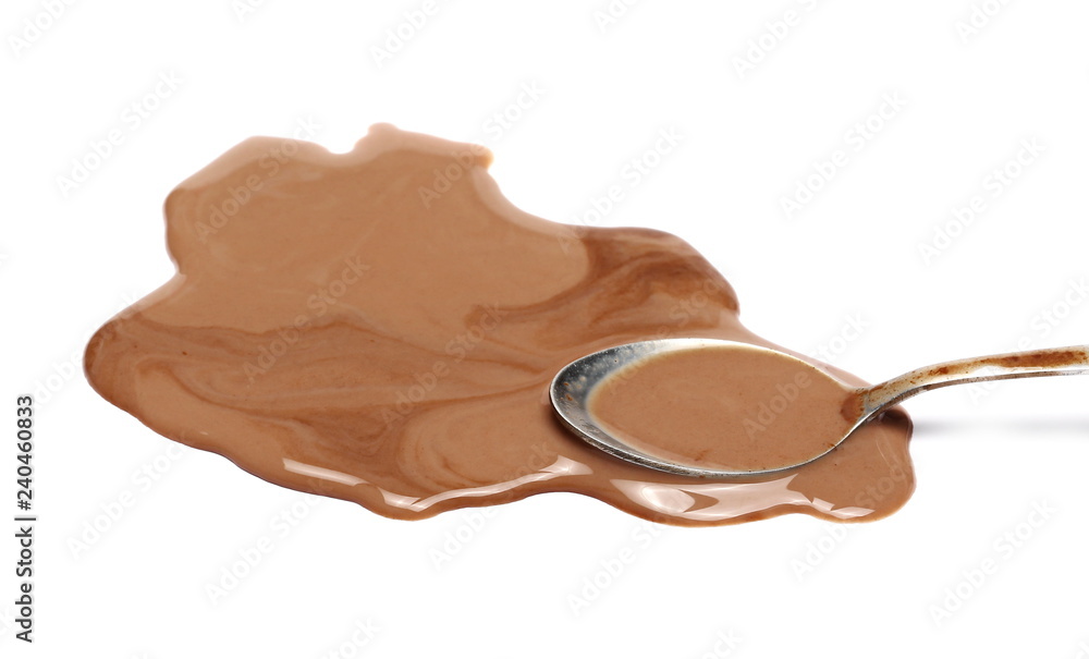 Spilled chocolate milk puddle and metal spoon isolated on white background  Stock Photo | Adobe Stock