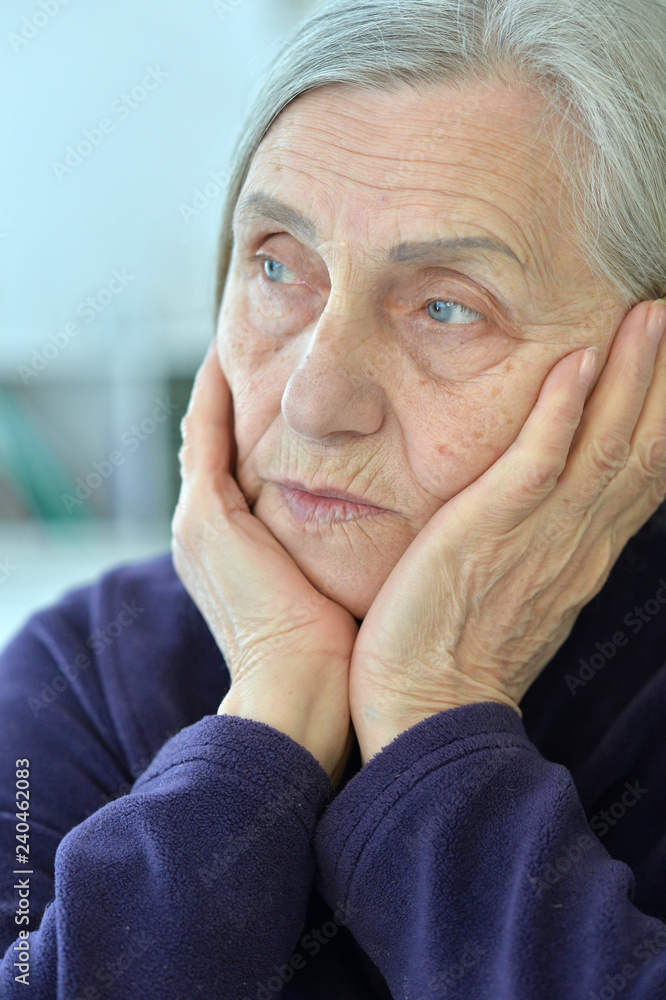 Close up portrait of tired senior woman Close up portrait of tired senior woman