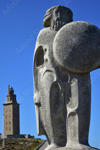 Tower of Hercules and Stone Celtic Warrior. La Coruna, Spain. photo