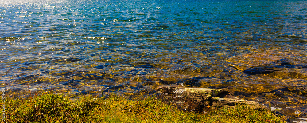 Lake water and stone shore