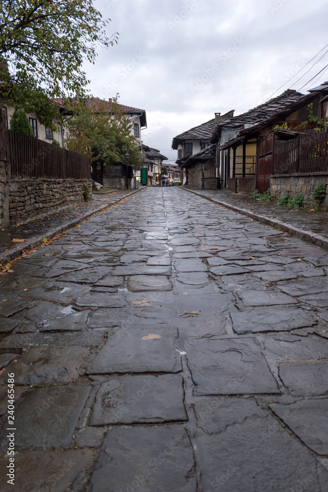 An ancient stone street in the center of the city. An ancient stone street in the center of the city.