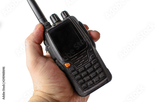 male hand holding a walkie talkie on a white background. Isolate