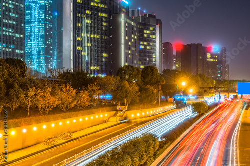 traffic light through city at night in china © hallojulie