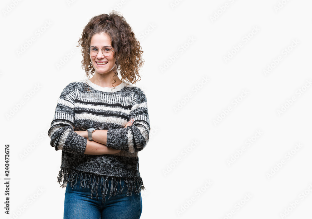 Beautiful brunette curly hair young girl wearing glasses over isolated background happy face smiling with crossed arms looking at the camera. Positive person. Beautiful brunette curly hair young girl wearing glasses over isolated background happy face smiling with crossed arms looking at the camera. Positive person.