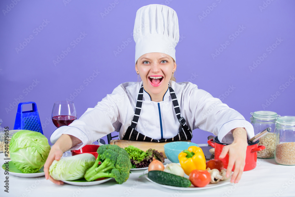 Lets start cooking. Woman chef cooking healthy food. Gourmet main dish recipes. Delicious recipe concept. Girl in hat and apron. Cooking healthy food. Fresh vegetables ingredients for cooking meal Lets start cooking. Woman chef cooking healthy food. Gourmet main dish recipes. Delicious recipe concept. Girl in hat and apron. Cooking healthy food. Fresh vegetables ingredients for cooking meal