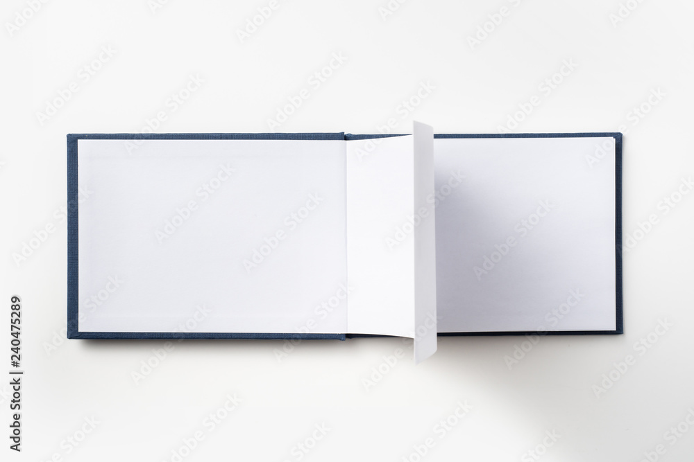 Top view of blue notebook with open page Top view of blue notebook with open page