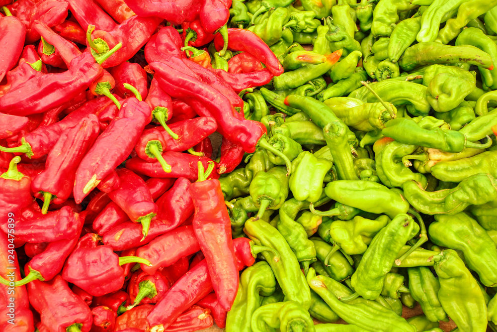 Red and green peppers displayed on food market in Kyrenia, Northern Cyprus, view from above. Red and green peppers displayed on food market in Kyrenia, Northern Cyprus, view from above.