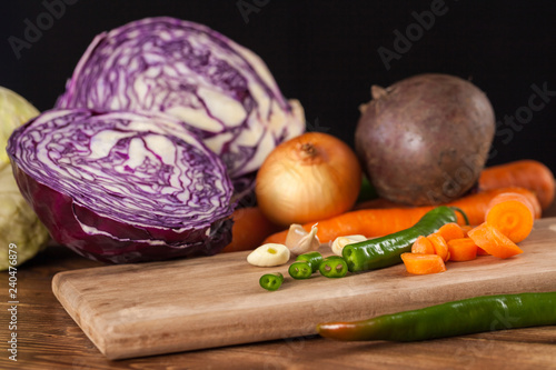 Fototapeta Naklejka Na Ścianę i Meble -  Verious fresh vegetables on a wooden table, healthy food