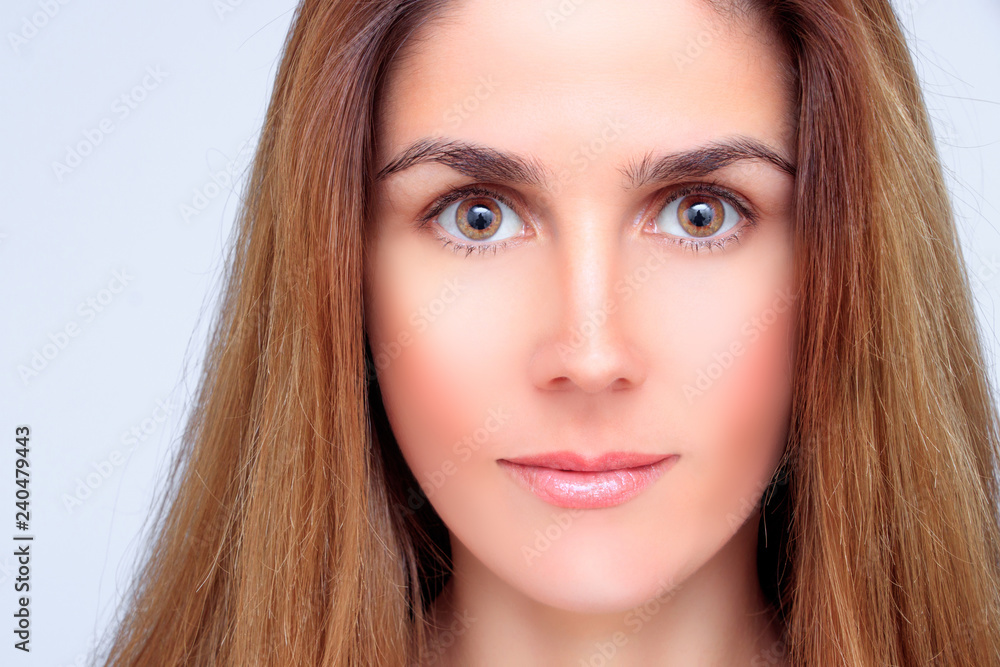 Beautiful face of a blond woman with amber eyes Beautiful face of a blond woman with amber eyes