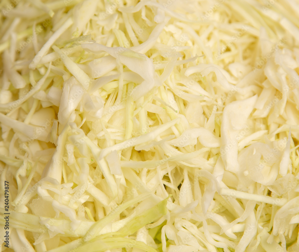 Sliced cabbage on the table as background