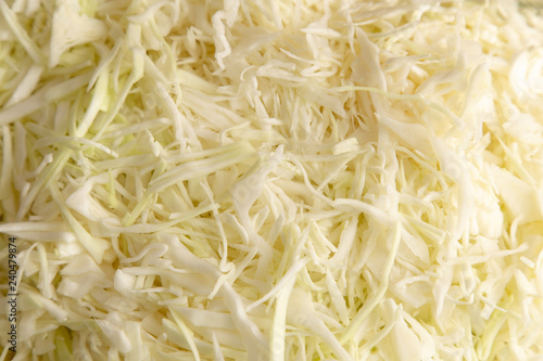 Sliced cabbage on the table as background