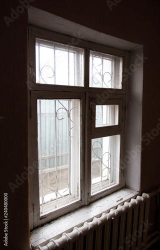 Old wooden window in the dark room as background