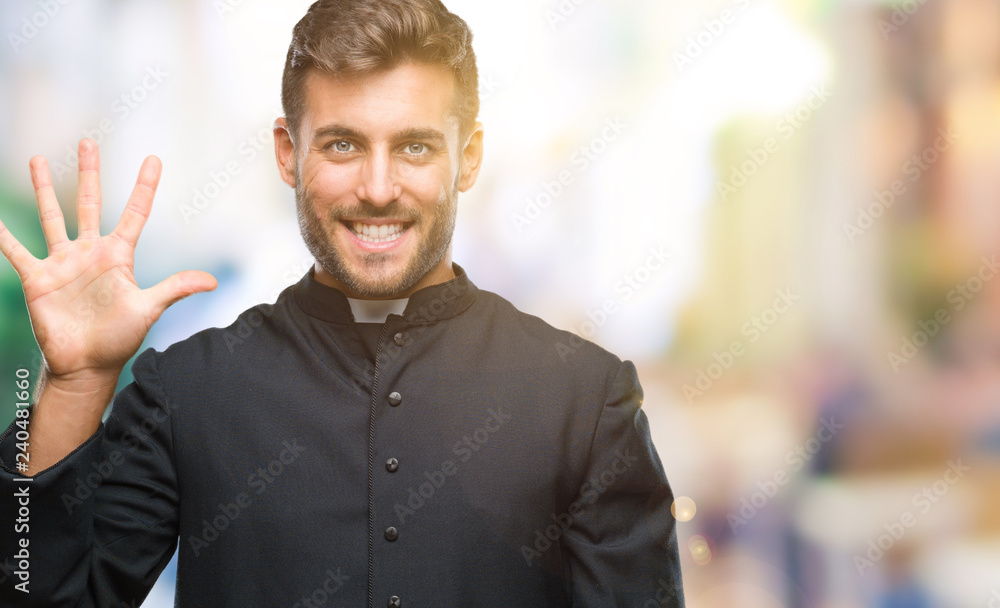 Young catholic christian priest man over isolated background showing and pointing up with fingers number five while smiling confident and happy. Young catholic christian priest man over isolated background showing and pointing up with fingers number five while smiling confident and happy.