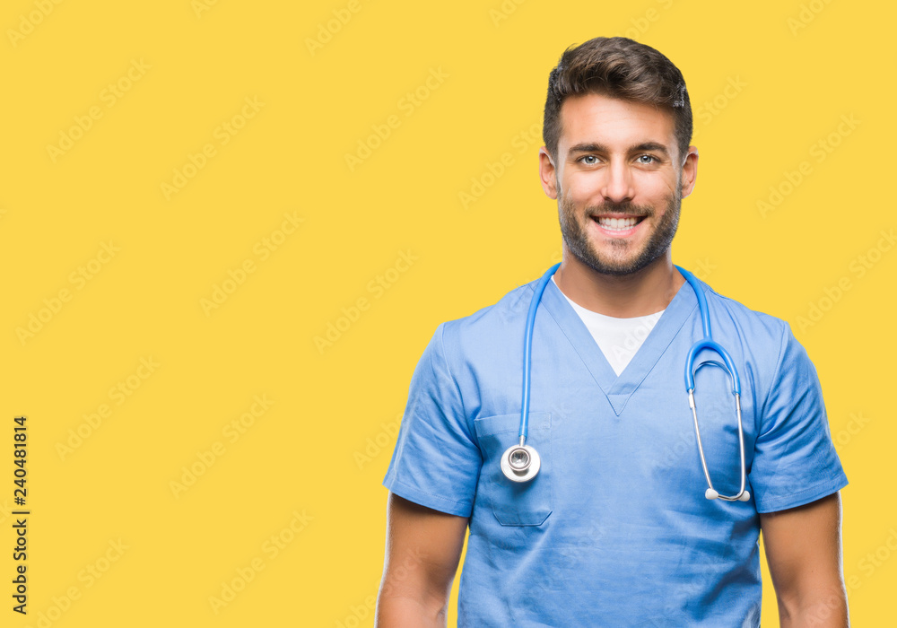 Young handsome doctor nurse man over isolated background with a happy and cool smile on face. Lucky person. Young handsome doctor nurse man over isolated background with a happy and cool smile on face. Lucky person.