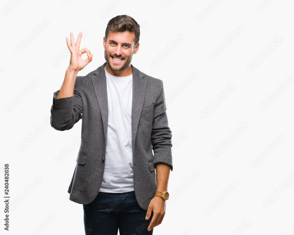 Young handsome business man over isolated background smiling positive doing ok sign with hand and fingers. Successful expression. Young handsome business man over isolated background smiling positive doing ok sign with hand and fingers. Successful expression.