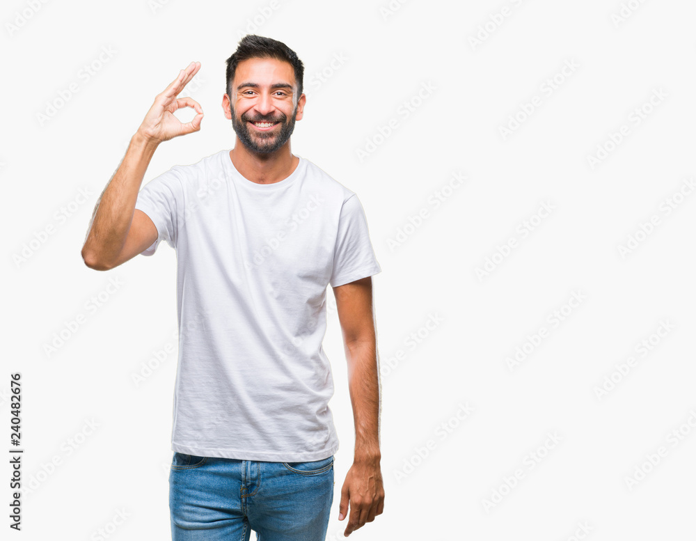Adult hispanic man over isolated background smiling positive doing ok sign with hand and fingers. Successful expression. Adult hispanic man over isolated background smiling positive doing ok sign with hand and fingers. Successful expression.