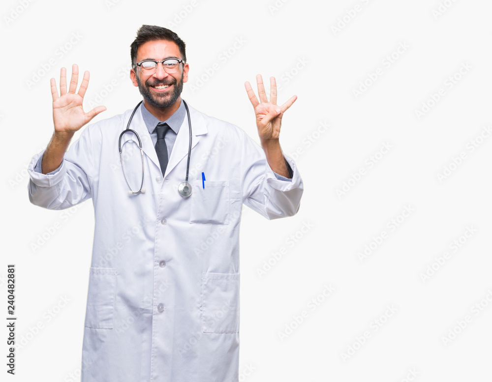 Adult hispanic doctor man over isolated background showing and pointing up with fingers number nine while smiling confident and happy. Adult hispanic doctor man over isolated background showing and pointing up with fingers number nine while smiling confident and happy.