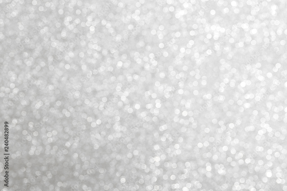 Silver glitter bokeh background Silver glitter bokeh background