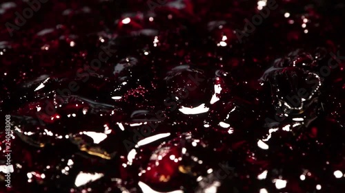 tasty and appetizing berry jam rotates
