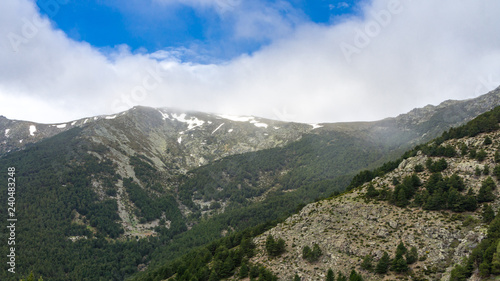 mountain range with snow on the summits in spring