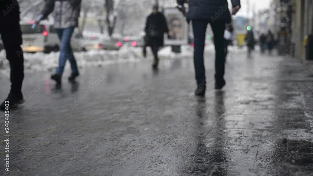 Peoples and cars on street in winter blurred Peoples and cars on street in winter blurred