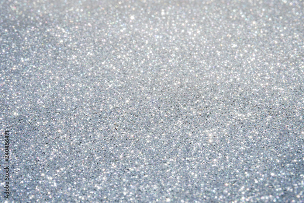 Silver and white glitter abstract bokeh background Christmas	