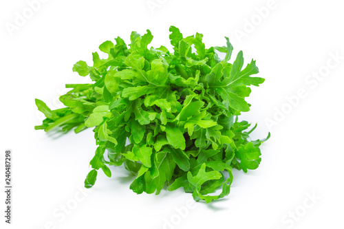 rucola or arugula, heap, salad leaves, isolated on white background