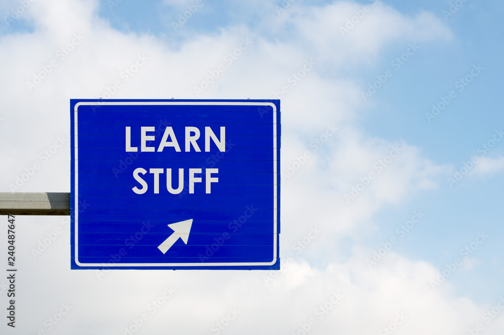 Learn Stuff words displayed on blue road sign Learn Stuff words displayed on blue road sign