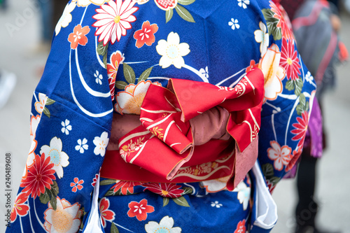 Young girl wearing Japanese kimono standing in front of Sensoji Temple in Tokyo, Japan. Kimono is a Japanese traditional garment. The word "kimono", which actually means a "thing to wear" © zasabe