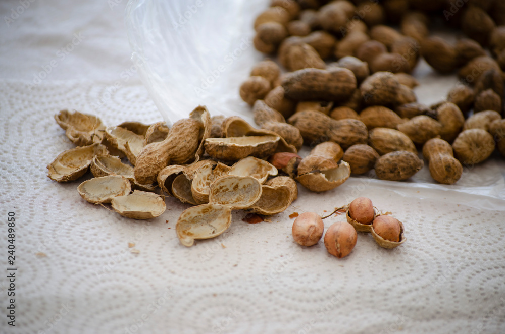 some peanuts with peel some peanuts with peel