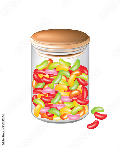 Jelly beans in a cylindrical glass jar isolated