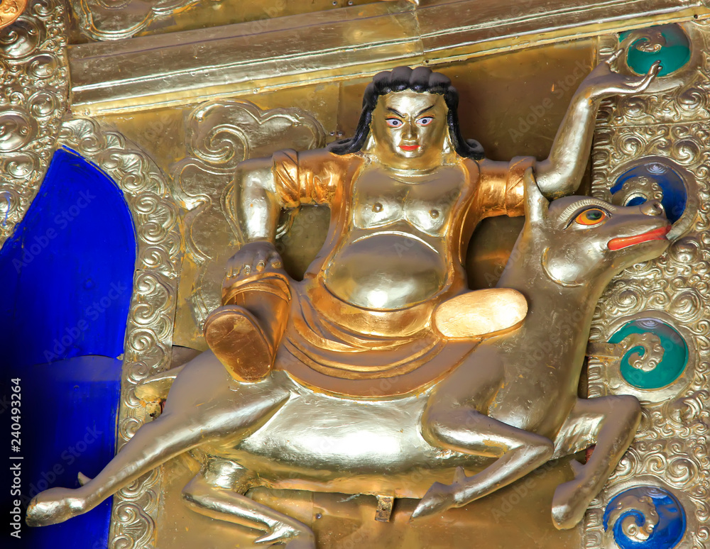 Golden body statue in a temple