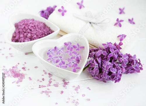 Spa towel and massage products with lilac flowers