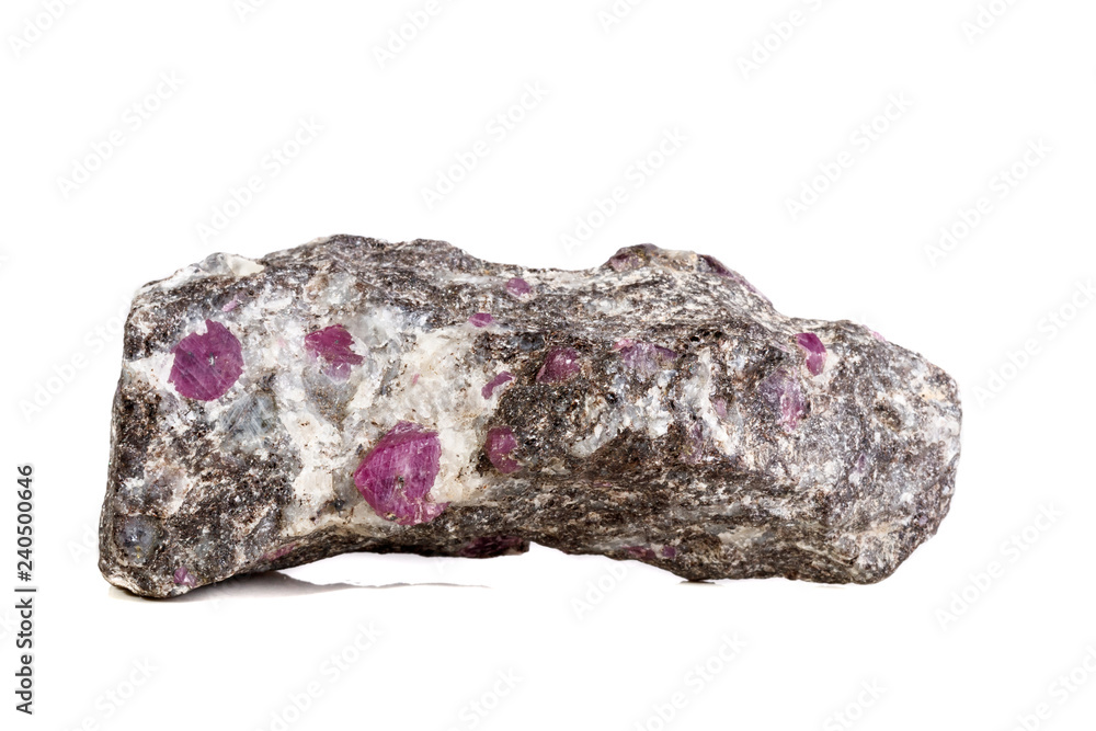 Macro of a mineral Ruby stone on a white background Macro of a mineral Ruby stone on a white background