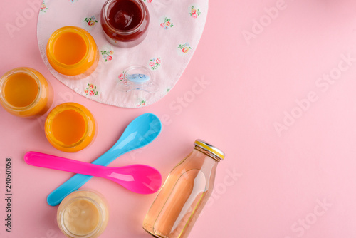 Spoons and jars of puree