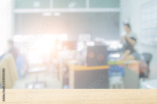 Foto Businessmen blur in the workplace or work space of laptop on table in office room with computer or shallow depth of focus of abstract background