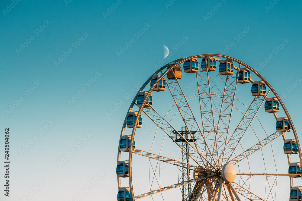 Helsinki, Finland. Moon Rising Above Ferris Wheel - obrazy, fototapety, plakaty 
