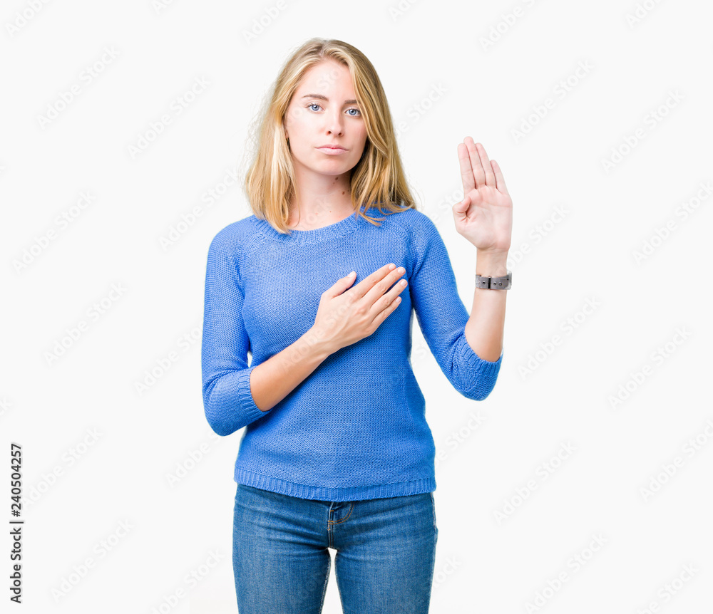 Beautiful young woman wearing blue sweater over isolated background Swearing with hand on chest and open palm, making a loyalty promise oath Beautiful young woman wearing blue sweater over isolated background Swearing with hand on chest and open palm, making a loyalty promise oath