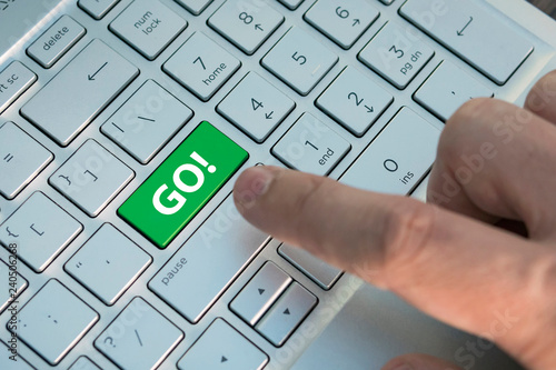 concept of Modern Keyboard. Metallic Keyboard with the words GO