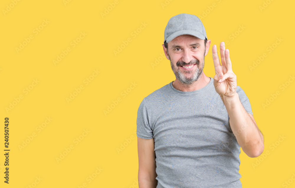 Handsome middle age hoary senior man wearing sport cap over isolated background showing and pointing up with fingers number three while smiling confident and happy. Handsome middle age hoary senior man wearing sport cap over isolated background showing and pointing up with fingers number three while smiling confident and happy.