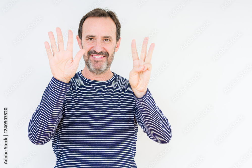 Handsome senior man over isolated background showing and pointing up with fingers number eight while smiling confident and happy. Handsome senior man over isolated background showing and pointing up with fingers number eight while smiling confident and happy.