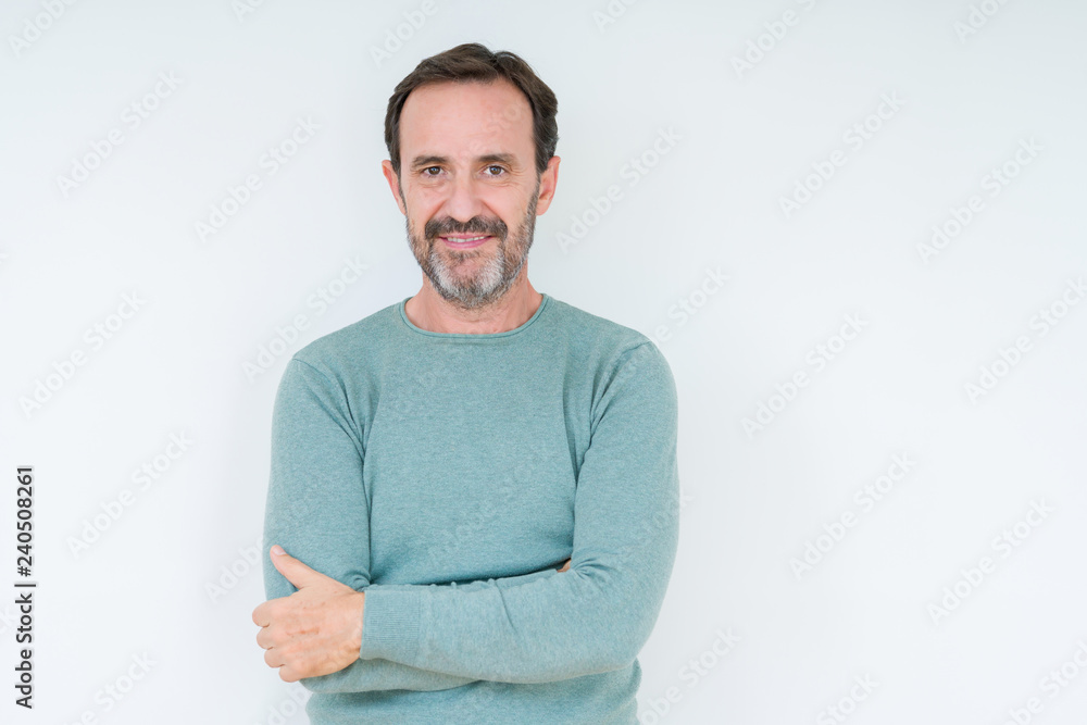 Obraz premium Senior man over isolated background with serious expression on face. Simple and natural looking at the camera.