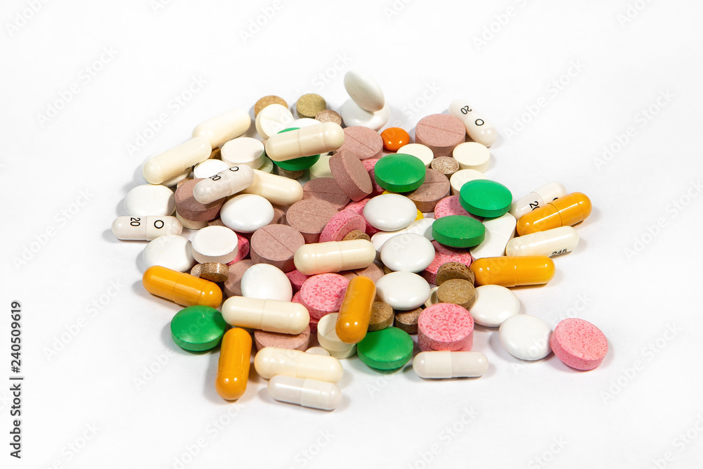 colorful pills on white background colorful pills on white background
