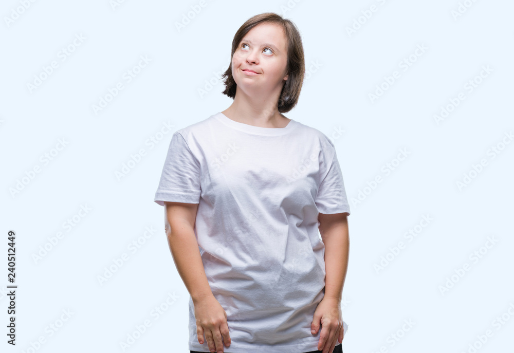 Young adult woman with down syndrome over isolated background smiling looking side and staring away thinking. Young adult woman with down syndrome over isolated background smiling looking side and staring away thinking.