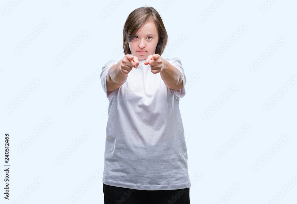 Young adult woman with down syndrome over isolated background pointing fingers to camera with happy and funny face. Good energy and vibes. Young adult woman with down syndrome over isolated background pointing fingers to camera with happy and funny face. Good energy and vibes.