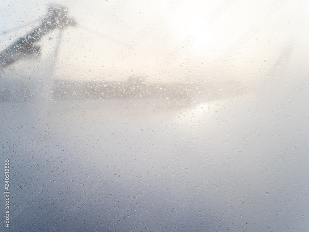 liquid drops on porthole during de-icing liquid drops on porthole during de-icing
