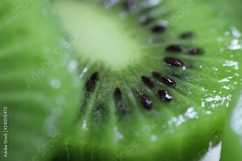 Fresh and juicy kiwi fruit background macro photo